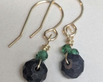 Tiny dangle earrings, faceted navy lapis rondelles with green zircon accents, hand made gold tone ear wires