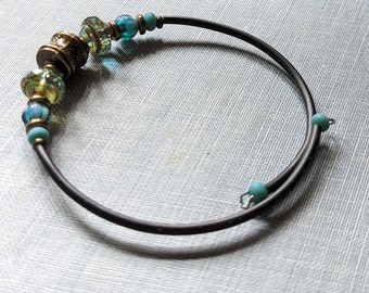 Memory wire single bangle, easy on and off,  Rubber accents, Czech glass beads, Brass and teal beads, perfect gift