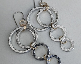 Light weight dangle earrings, hammered silver circles with gold accents, handmade stainless steel earwires