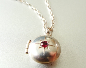 Child's Silver locket with garnet starburst engraved sterling Tiny locket