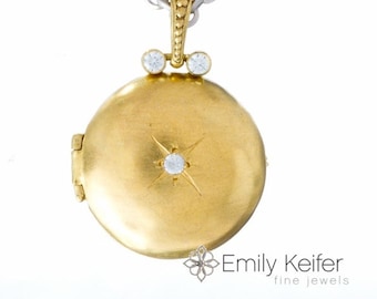 Gold locket with starburst gemstone and engraving, 24" chain North Star