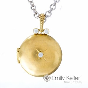 Gold locket with starburst gemstone and engraving, 24&quot; chain North Star