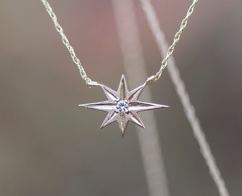 Gold star necklace Estrella starburst 10k gold diamonds