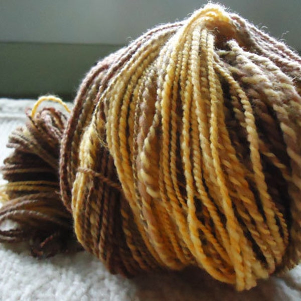 Golden, handspun merino lace weight yarn, 220 yds