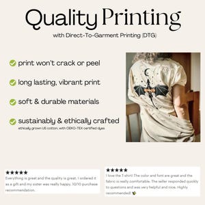 May include: A cream-coloured t-shirt with a black and orange dragon design on the back, set against a crescent moon and stars. The image also includes the text "Quality Printing" and customer reviews.