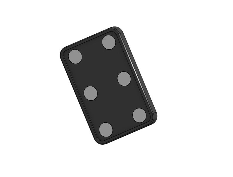 May include: Black rectangular tile with five round gray dots.