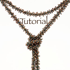 May include: A brown and turquoise beaded necklace with a knot at the bottom. The necklace is made of small beads and has a delicate, intricate design. The word "Tutorial" is written in black text on a white background.