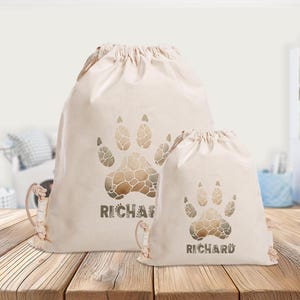 Sac de sport personnalisé - dinosaure - empreinte - maternelle - école - sac de sport - sac à dos - vêtements de rechange - dino-stone age-large-mini