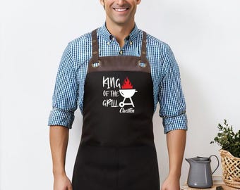 Delantal de parrilla - Rey de la Parrilla - Negro - Con polipiel - Regalo - Temporada de parrilladas - Delantal de cocina - Día del Padre - Temporada de jardinería