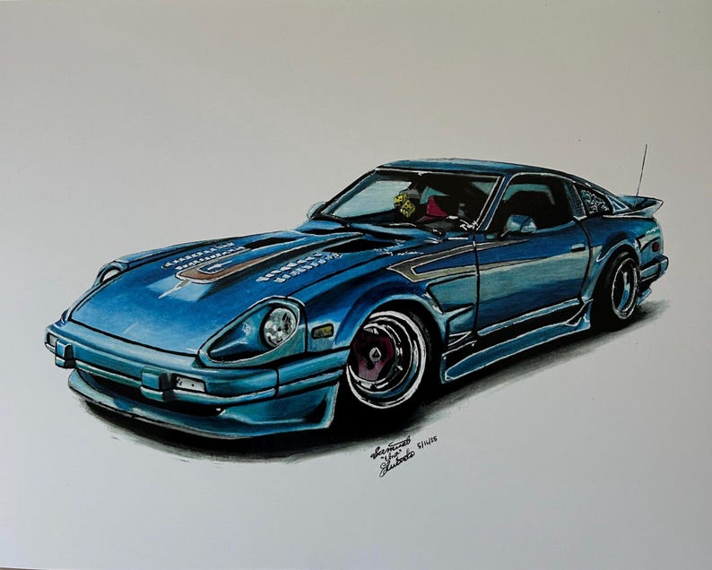May include: A blue sports car illustration with a low profile, featuring a prominent hood and sleek lines. The car has silver accents, dark wheels, and a spoiler. The artwork is set against a white background.