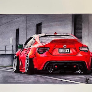 May include: A red sports car with a black rear spoiler and a license plate that reads "SEIXY". The car is parked in front of a gray wall.