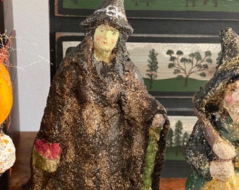 Witch teena flanner original silver glass glitter. glass glitter tarnishes and looks spookier thru time