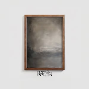 The painting of abstract art is displayed in a dark wooden frame with a earthy abstract art.