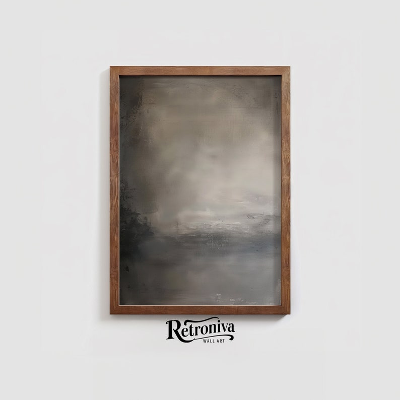 The painting of abstract art is displayed in a dark wooden frame with a earthy abstract art.