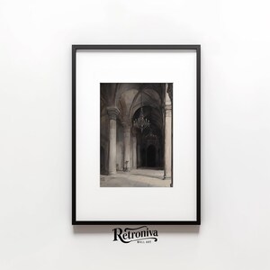 The watercolor architectural scene is displayed in a modern black frame with the moody church art.