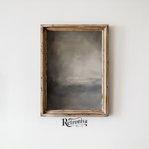 The painting of abstract art is displayed in a vintage wooden frame with a earthy abstract art.