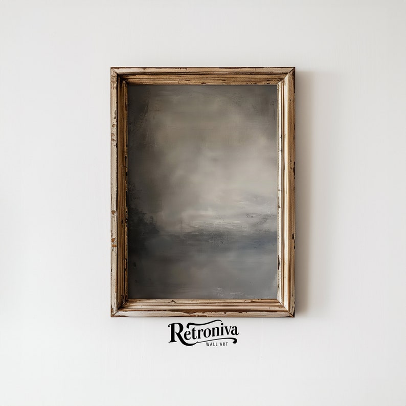 The painting of abstract art is displayed in a vintage wooden frame with a earthy abstract art.