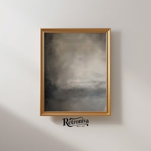 The painting of abstract art is displayed in a modern golden frame with a earthy abstract art.