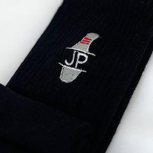 May include: Black socks with a white and red bowling pin logo and the letters "JP" embroidered on the front.