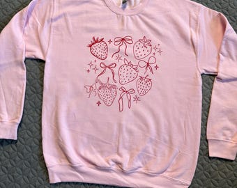 Coquette strawberries crew neck sweater, red, berries, bows, girly, preppy, cute clothing, gift ideas, comfy, pink, white.