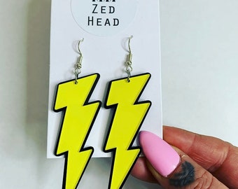 Lightning bolt acyrlic earrings yellow and black bowie festival party style