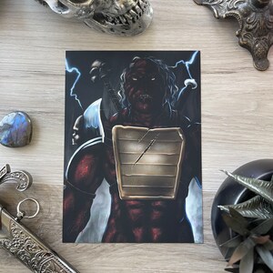 May include: A digital illustration of a red-skinned warrior with a golden breastplate and a sword. The warrior has a fierce expression and is surrounded by lightning bolts.