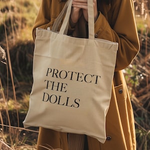 Protect The Dolls Tragetasche, Umhängetasche aus 100% Baumwolle, Queer Tragetasche, Pride Tragetasche, LGBT-Schultertasche