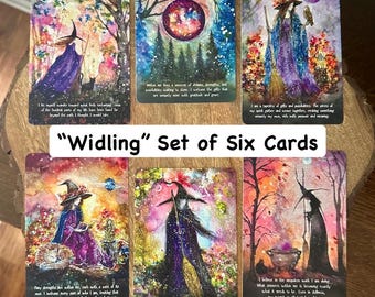 May include: A set of six rectangular cards titled Widling, each featuring colourful, painterly illustrations of figures in pointed hats, owls, cats, and magical landscapes. Each card includes printed text at the bottom in a white sans-serif font.