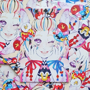 May include: A colorful anime-style illustration of a character with large eyes, winking, and smiling. The character has light hair with rainbow stripes, adorned with bows and cherries. The artwork features a vibrant palette of pink, blue, yellow, and red.