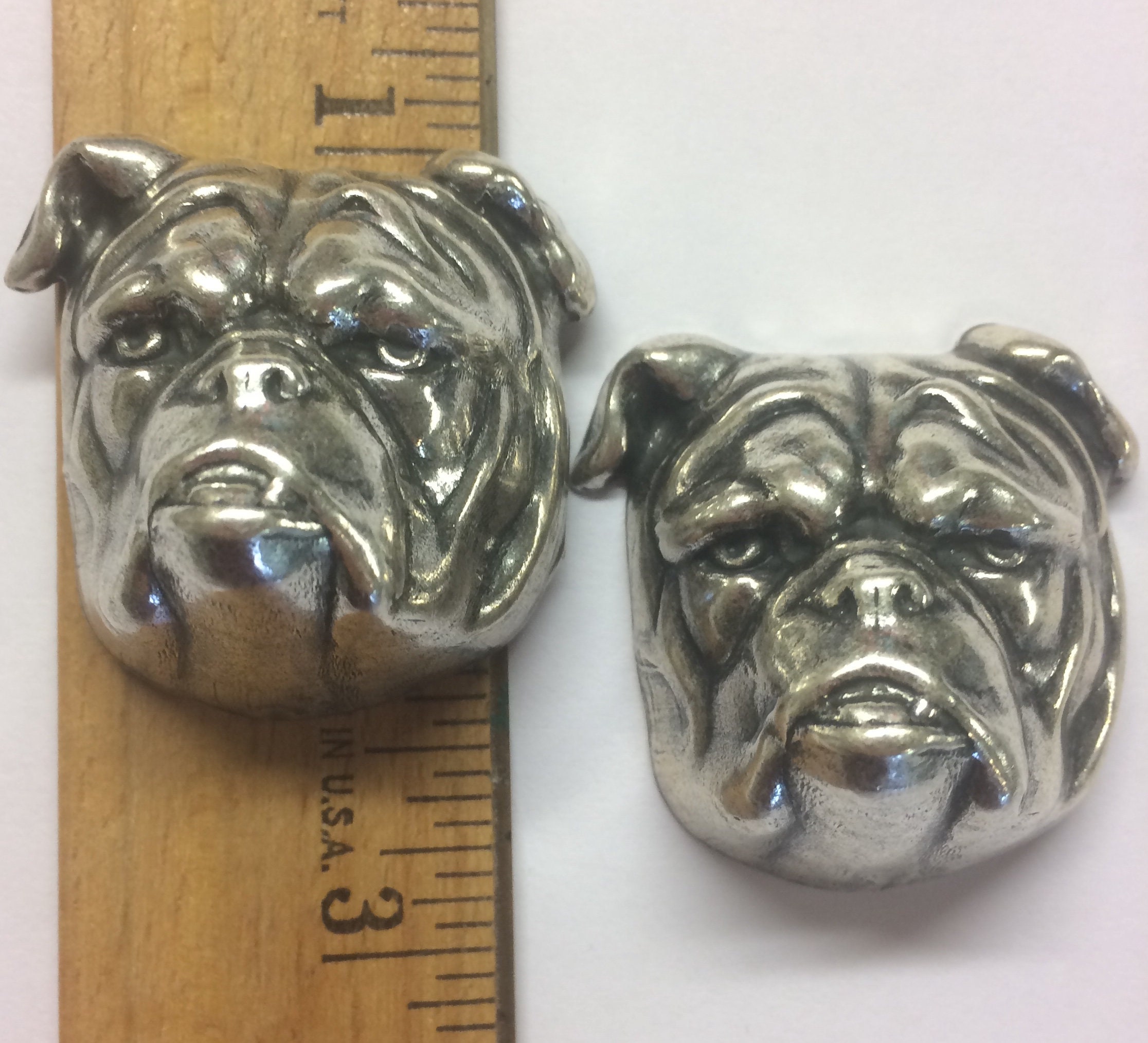 large silver bulldog statue