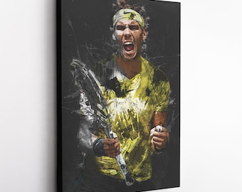 May include: A close-up of a tennis player in a yellow and black shirt, holding a tennis racket. The player is looking intensely at the camera and has a determined expression on his face. The background is a dark gray with a textured effect.