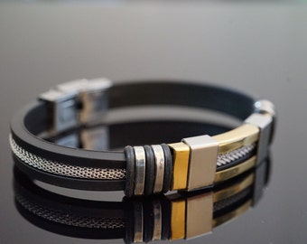 Stijlvolle siliconen armbanden met roestvrijstalen en gouden accenten - elegantie ontmoet moderniteit