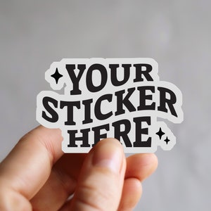 May include: White sticker with black text that reads "YOUR STICKER HERE" with a small star on either side of the text.