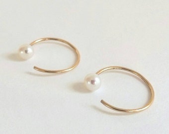 Minimalist pearl huggie earring. Hoop sleeper earrings. 14K gold fill  ball end hug hoops. Pearl huggie earrings. Handmade fine jewelry.