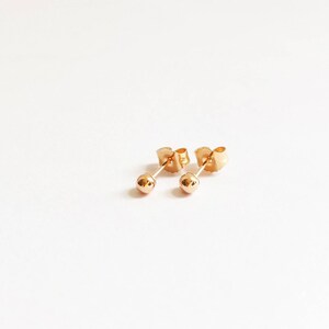Minimalist solid 14K rose gold ball stud earrings. Classic small rose gold studs. Small 14K gold stud earrings. Rose gold ball studs. image 4