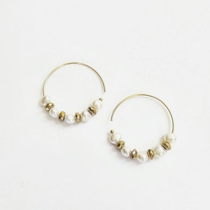 Pearl and hematite hoop earrings. 14K Gold Fill hoops with baroque freshwater pearls and golden hemitite. Pearl hoop earrings.