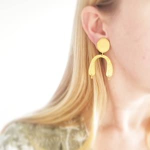 Amulet coin arc drop earrings. Hammered amulet drop earrings. Gold Statement earrings. Large drop earrings. Large stud or drop earrings. image 1