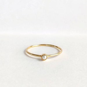 14K Yellow gold petite pearl minimalist ring. Pearl promise ring. Freshwater pearl Solitaire stacking ring. Delicate Gold wedding ring.