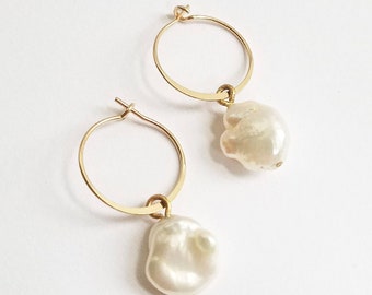 Baroque pearl amulet hoop earrings. 14K goldfill hoop earrings with pearl amulets. Baroque pearl hoop earrings.