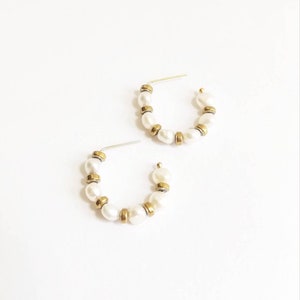 Minimalist white baroque pearl hoop earrings. White natural pearl hoops. Pearl hoop earrings. 14K goldfill hoop earrings. 14K goldfill pearl