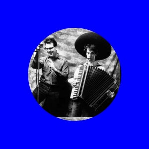 Johns with sombrero and accordion button or magnet