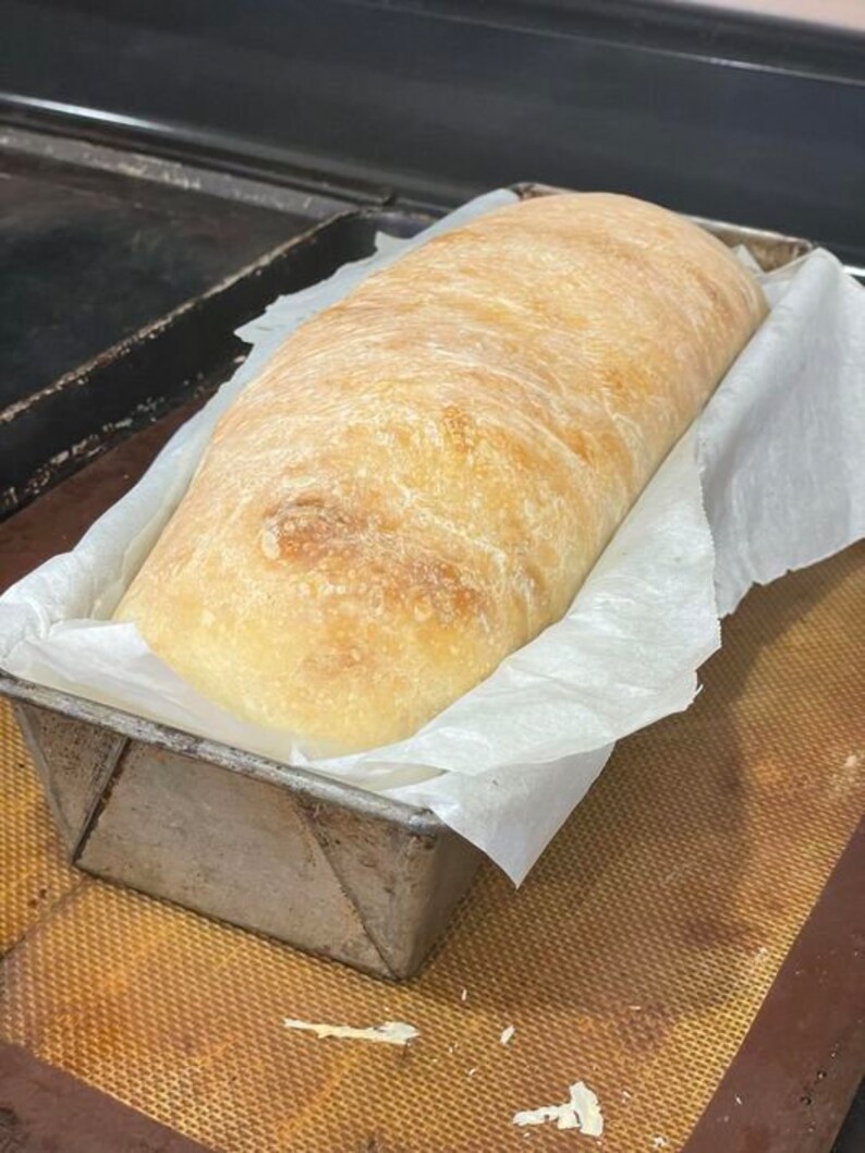 Easy sourdough sandwich bread recipe with a soft, tender crumb and a golden crust. Step-by-step instructions for making a delicious, homemade sandwich loaf using sourdough starter. Ideal for beginner bakers.