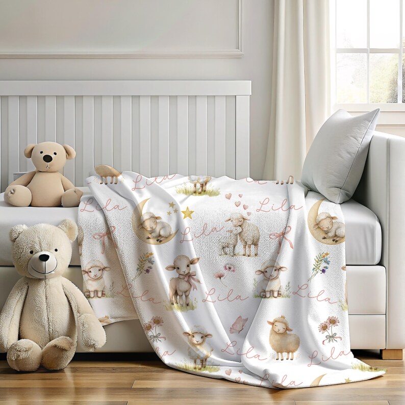 A personalized custom name white velveteen blanket with whimsical lambs, pink bows, stars, flowers, hearts and butterflies draped over a daybed.
