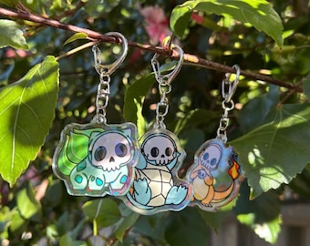 Skelemon Holographic Acrylic Keychain | Gen 1 Starters