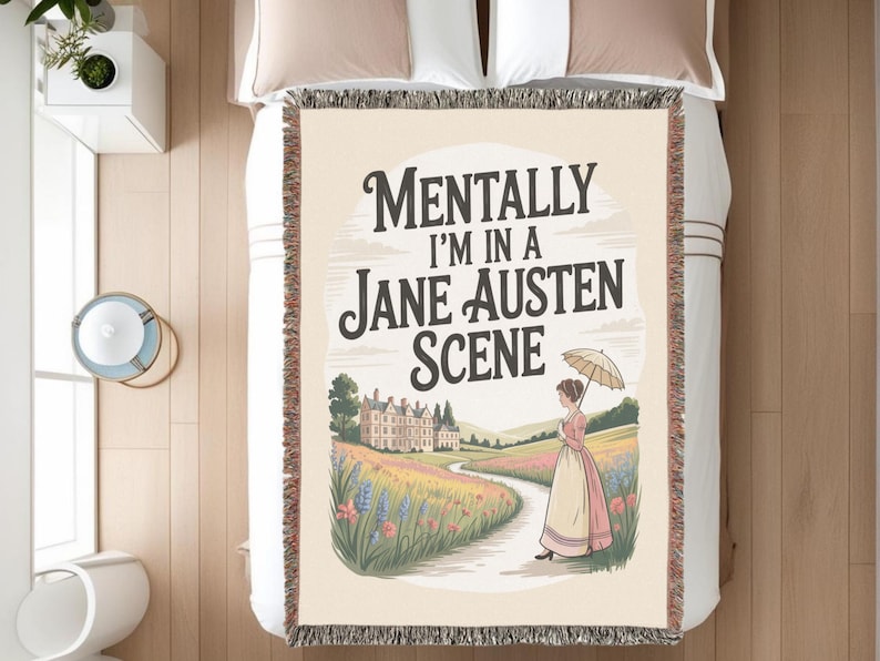 May include: Woven throw blanket with the text "Mentally I'm in a Jane Austen Scene." The design features a woman in a period dress holding an umbrella, walking on a path towards a manor house. The blanket has a cream background.