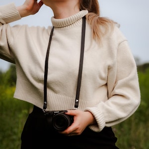Fine bandoulière noire pour appareil photo