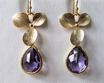 Gold orchids with faceted Tanzanite glass