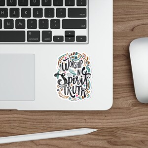 May include: A sticker with a colorful floral design and the text "Worship in Spirit & Truth" with the scripture reference "John 4:24".
