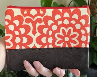 Red lotus and faux leather zipper pouch