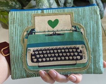 Typewriter Applique on Woodgrain Zipper pouch